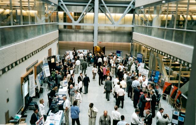 NAVSEA employees visit the SeaPort MAC contractors during the first SeaPort MAC fair.